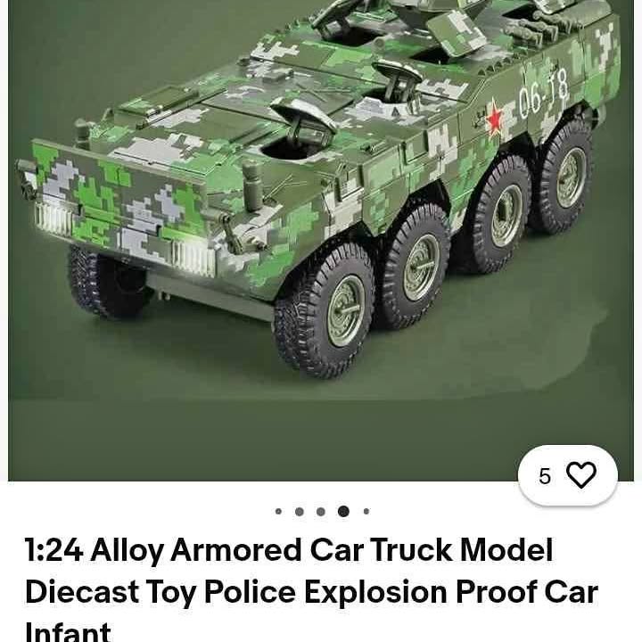Green camouflage diecast armored tank toy truck with four large wheels, side front view