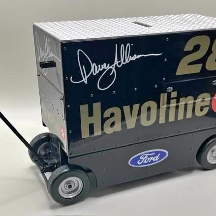 Blue and gray diecast pit wagon-style race trailer with Havoline logo and Ford badge
