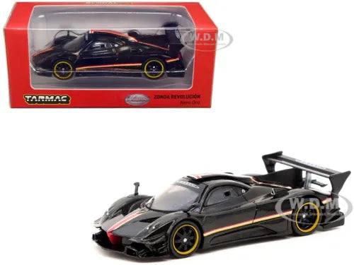 PAGANI ZONDA REVOLUCION black diecast car model with gold accents and open hood