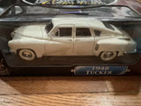 Cream 1948 Tucker Torpedo diecast model car in box with clear window