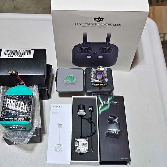 FPV drone remote controller and module kit with packaging and cables