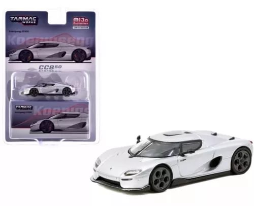 Silver 1:64 diecast sports car with black accents, shown with retail package