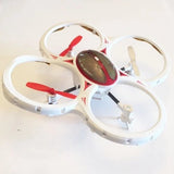 White mini quadcopter drone with red prop decals and central lens, 4-rotor design