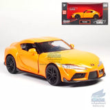 Matt orange sports diecast model car, front three-quarter view with black wheels