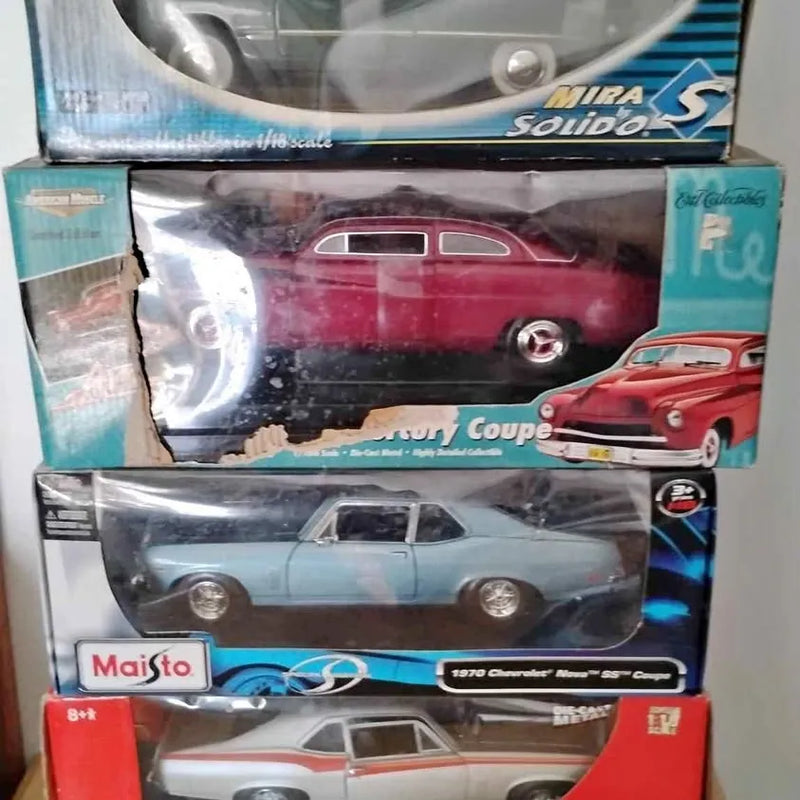 Diecast car set in box, maroon and light-blue classic coupe models