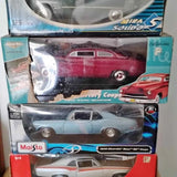 Diecast car set in box, maroon and light-blue classic coupe models