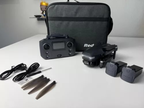 Drone with camera starter kit: controller, drone, propellers, carrying bag