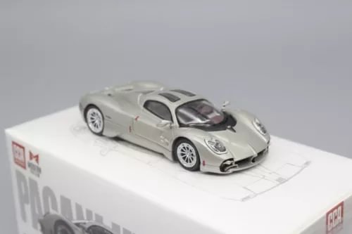 1/64 scale Pagani Utopia diecast sports car model, light silver with black accents