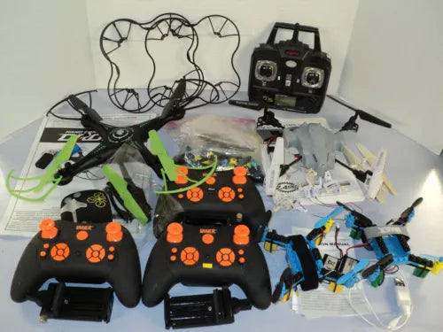 RC quadcopter drone kit with handheld controller and multiple prop frames