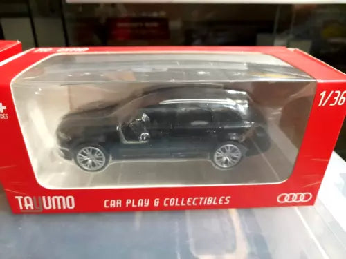 Black 1/36 scale diecast model car in sealed display box