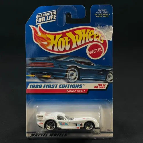 Hot Wheels diecast car in sealed blister, white racing car