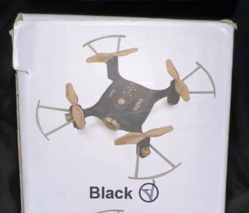 Mini pocket RC drone box with black illustrated quadcopter and four propellers