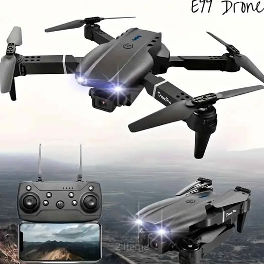 Black quadcopter drone with dual cameras and remote controller, four propellers visible