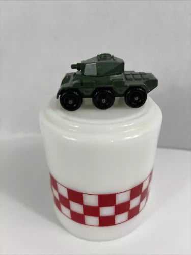 Dark green diecast armored car model with 6x6 wheels and turret detail