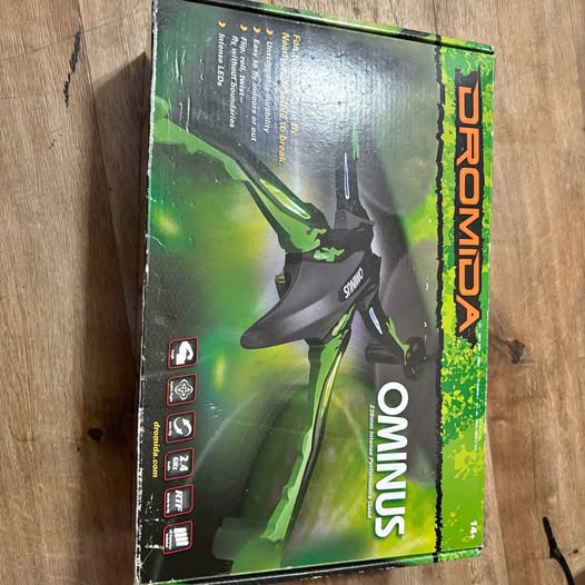 Drone box packaging with Gresham OR branding and OMNIVIS green graphics