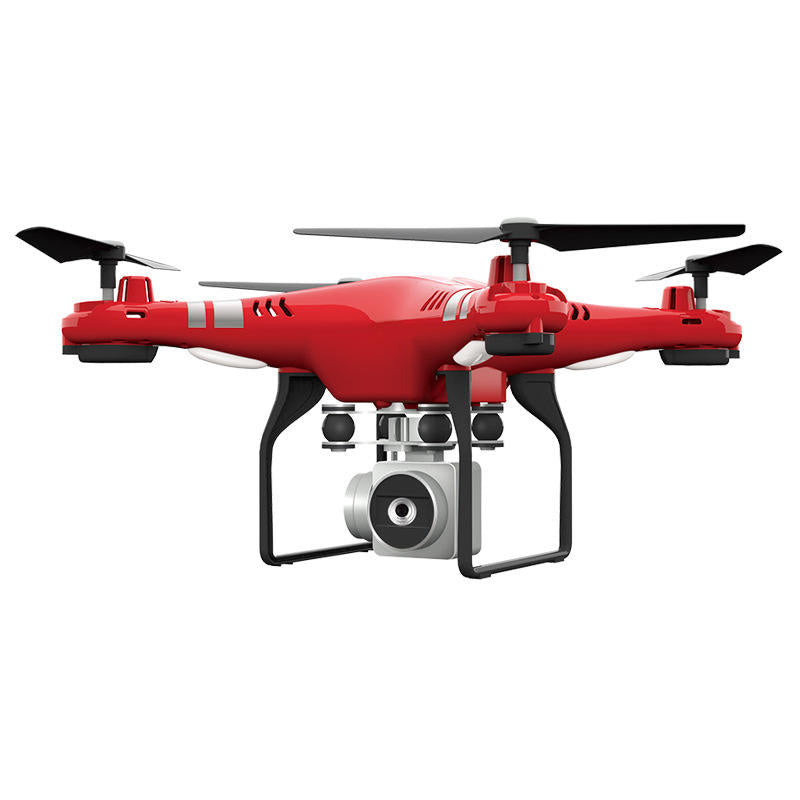 Red quadcopter RC drone with front camera and four propeller arms