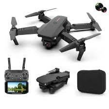 Gray quadcopter drone with remote controller, phone screen display, and extra battery case