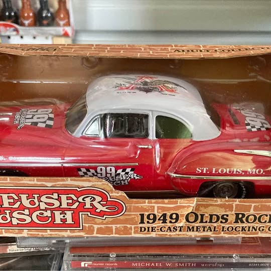 1949 Olds Rocket 88 die-cast metal car, red and white, in retail box