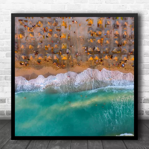 Square wall art print with framed aerial beach huts, shoreline waves in teal and orange
