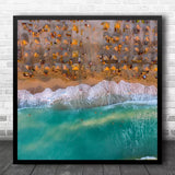 Square wall art print with framed aerial beach huts, shoreline waves in teal and orange