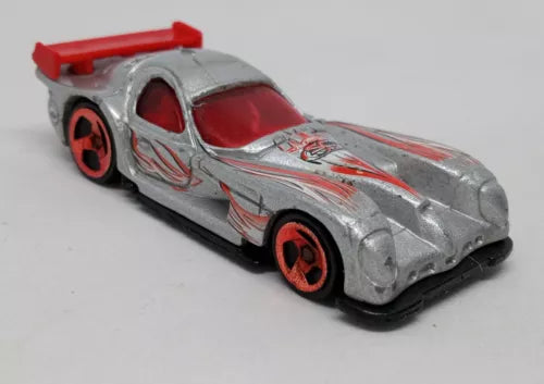 Silver and red toy diecast race car with open cockpit and red wheel rims