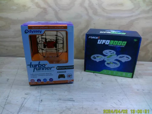 Small flying drone set in retail boxes, blue packaging