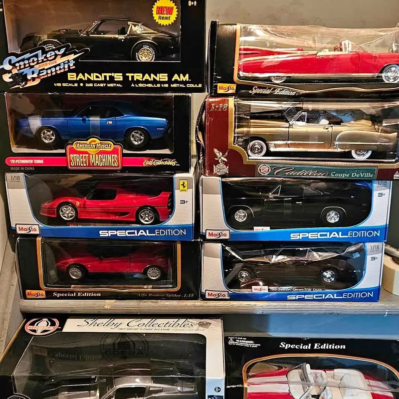 Diecast car set in special edition blister boxes, featuring blue, red, black vehicles