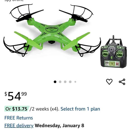 Green quadcopter camera drone with 4 propellers and remote controller