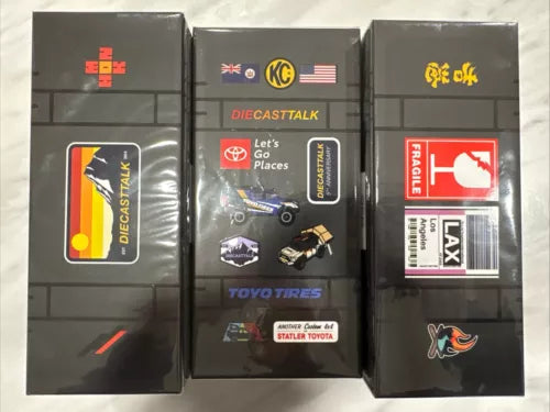 1/64 diecast Toyota Tacoma camper toy in black chrome box with decals and barcode