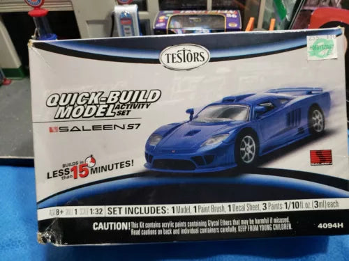 Quick-Build model set box with blue car illustration and Testors logo