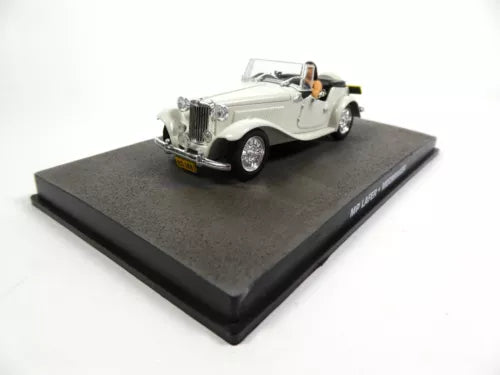 White diecast convertible model car on black display base