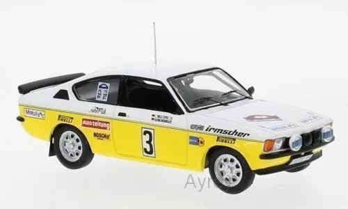 Yellow and white diecast coupe model car with rally number 3 and front headlights