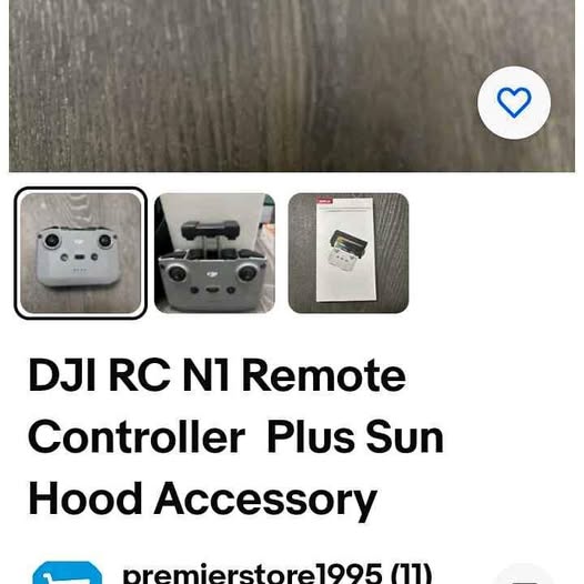 DJI RC remote controller with buttons and joystick, front view