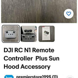 DJI RC remote controller with buttons and joystick, front view