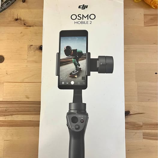 DJI Osmo 2 mobile gimbal with phone clamp and handheld grip, gray