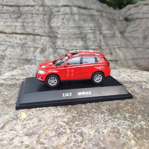 1/43 red Haval H2 SUV diecast model on display base