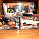 Boxed diecast motorcycle-themed vehicle models with Harley graphics