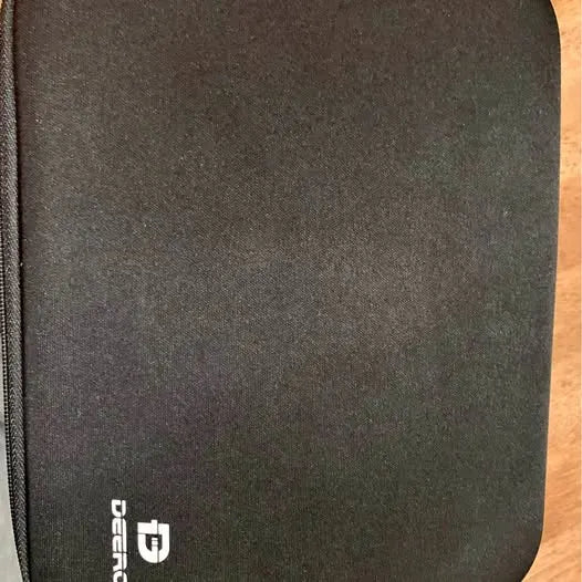 Dark textured drone pouch with white logo patch