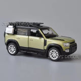 Land Rover Defender diecast SUV, light green with black roof and silver wheels