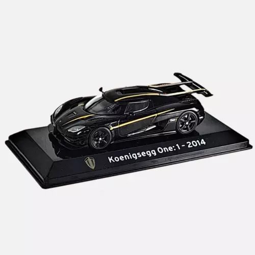 Koenigsegg One:1 2014 diecast model car, black with gold stripes on display base
