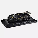 Koenigsegg One:1 2014 diecast model car, black with gold stripes on display base