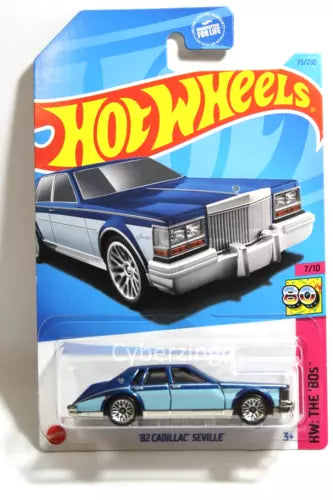 Hot Wheels diecast model car, blue 82 Cadillac Seville in blister pack