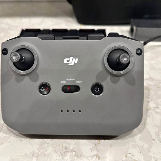 DJI Mavic Air 2 remote controller, gray with two joysticks and buttons