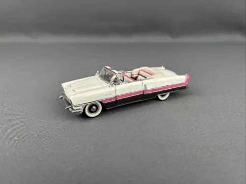 1/43 diecast convertible car in off-white with pink stripe and open top