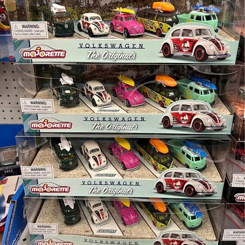 Volkswagen diecast toy cars in retail display boxes, assorted colors