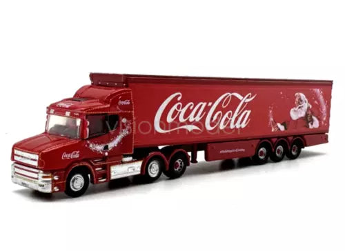 Red diecast delivery truck model with Coca-Cola logo and decorated trailer