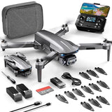 Gray quadcopter drone kit with camera, controller, carrying case, spare propellers and batteries