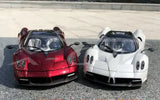Red and white diecast supercar model cars with front headlights