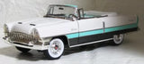 1:18 scale diecast car model, white body with mint green stripe and black accents