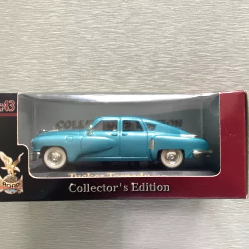 1/43 scale blue Tucker Torpedo diecast car in collector display box